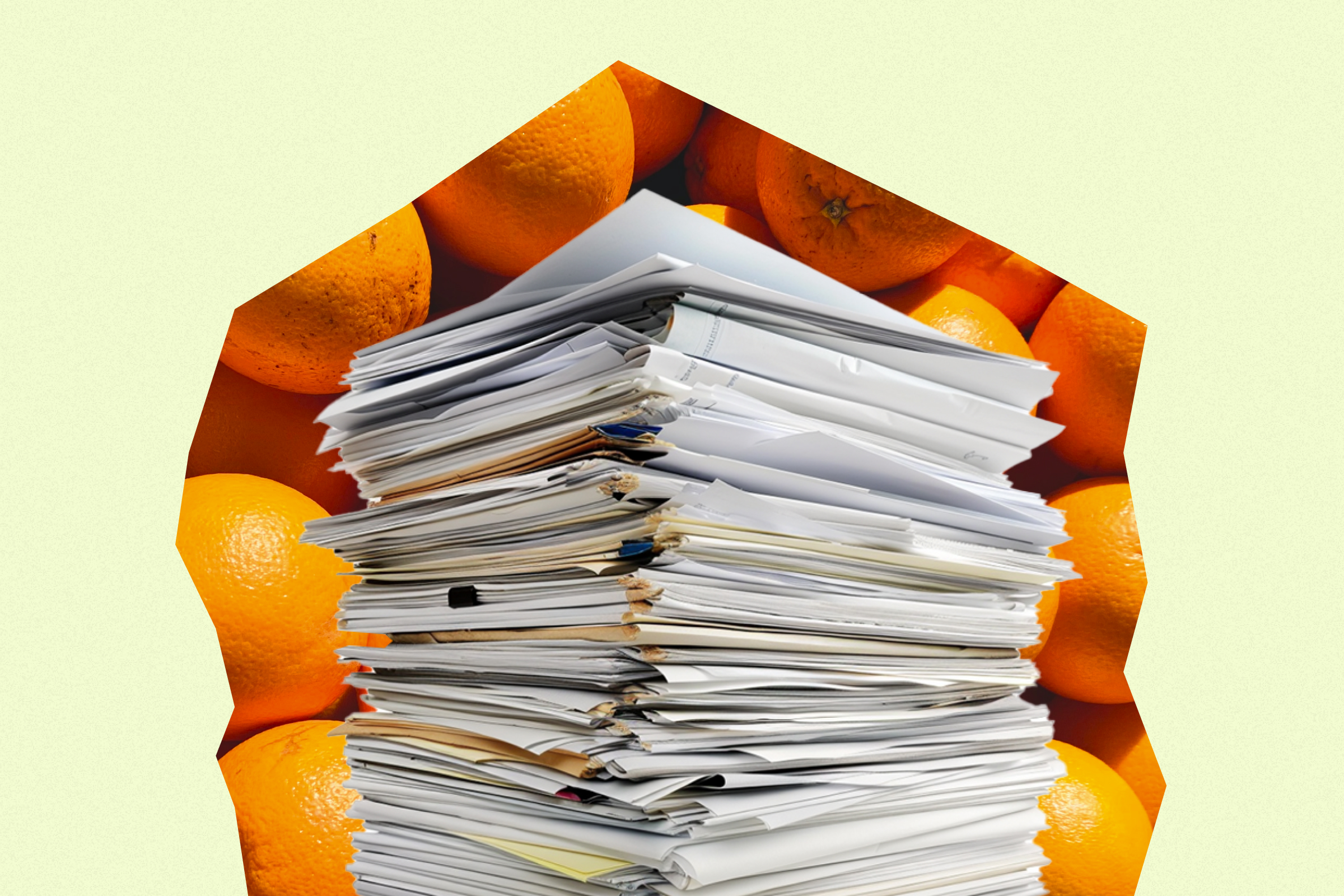 A stack of paper over fruit, demonstrating resources to help you take action for healthier food environments.